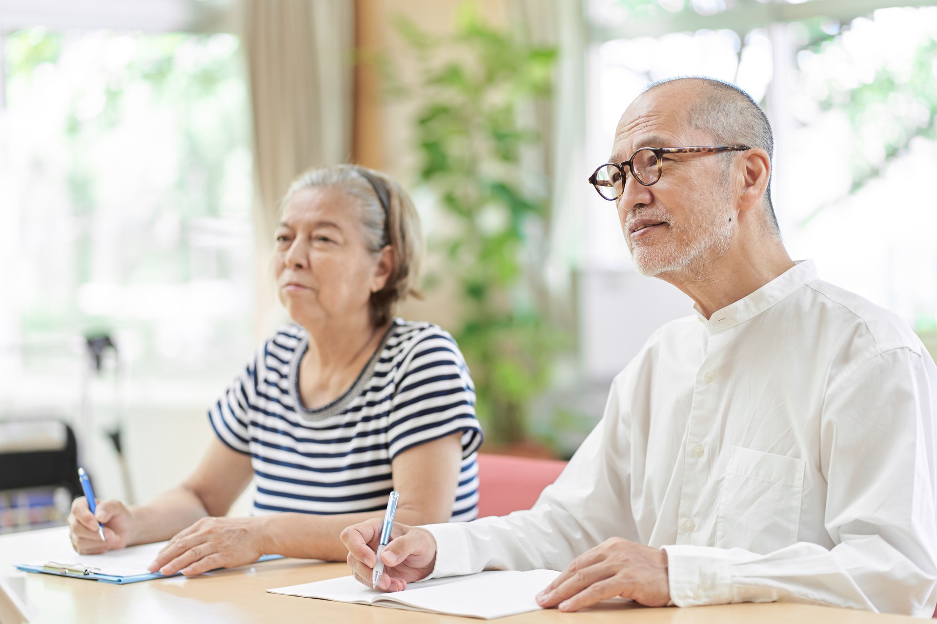 Elderly couple attending an inheritance seminar